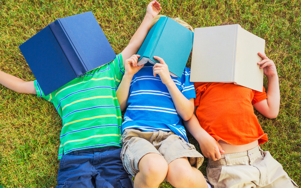 Three children reading.